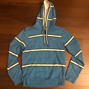 Men’s Lacoste blue, navy, and white striped pullover hoody